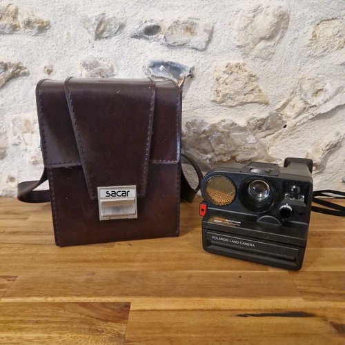 Polaroid land camera sonar - land,