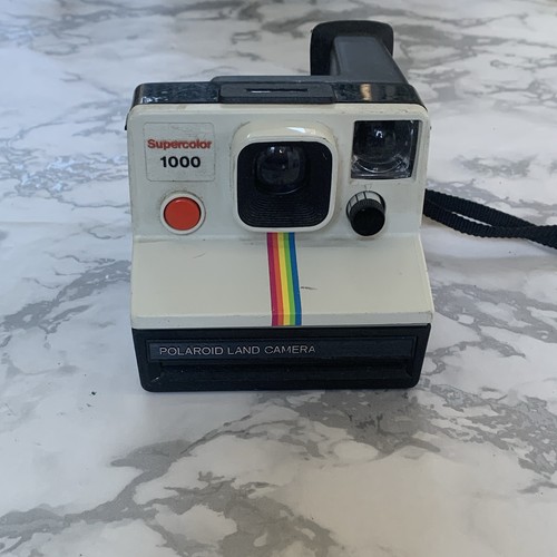 Polaroid land camera - land,